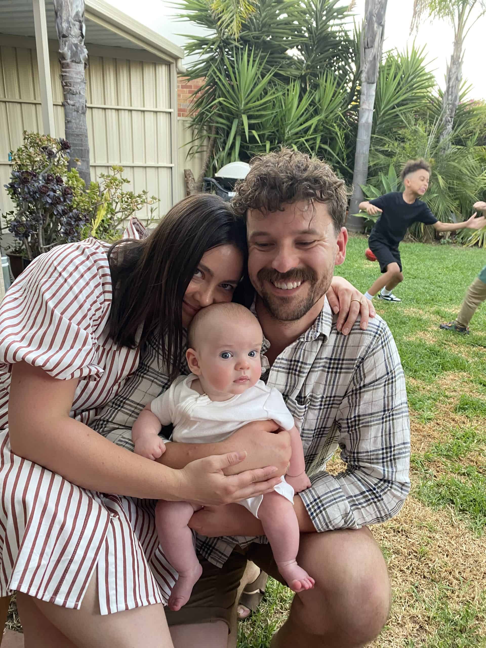 Family enjoying outdoor time, highlighting support for children with craniofacial conditions.